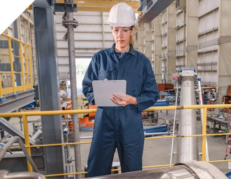 Agilyx employee working with advanced recycling technology for polystyrene waste, Styrenyx.